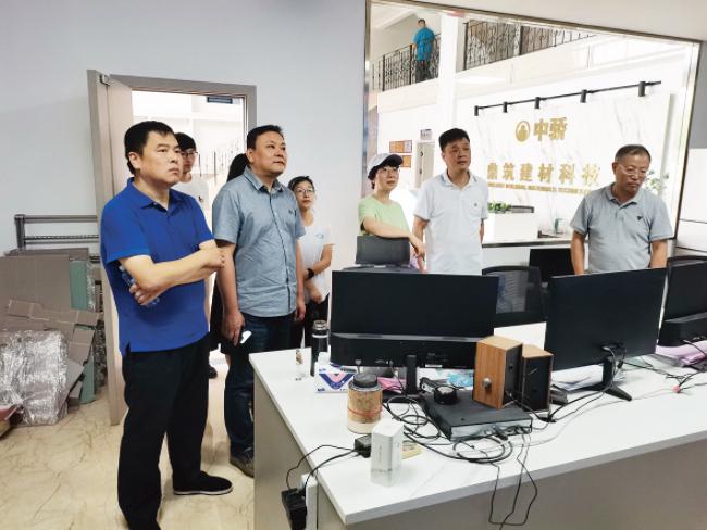 浙江金華市墻散中心開展預拌砂漿企業清潔生產達標驗收